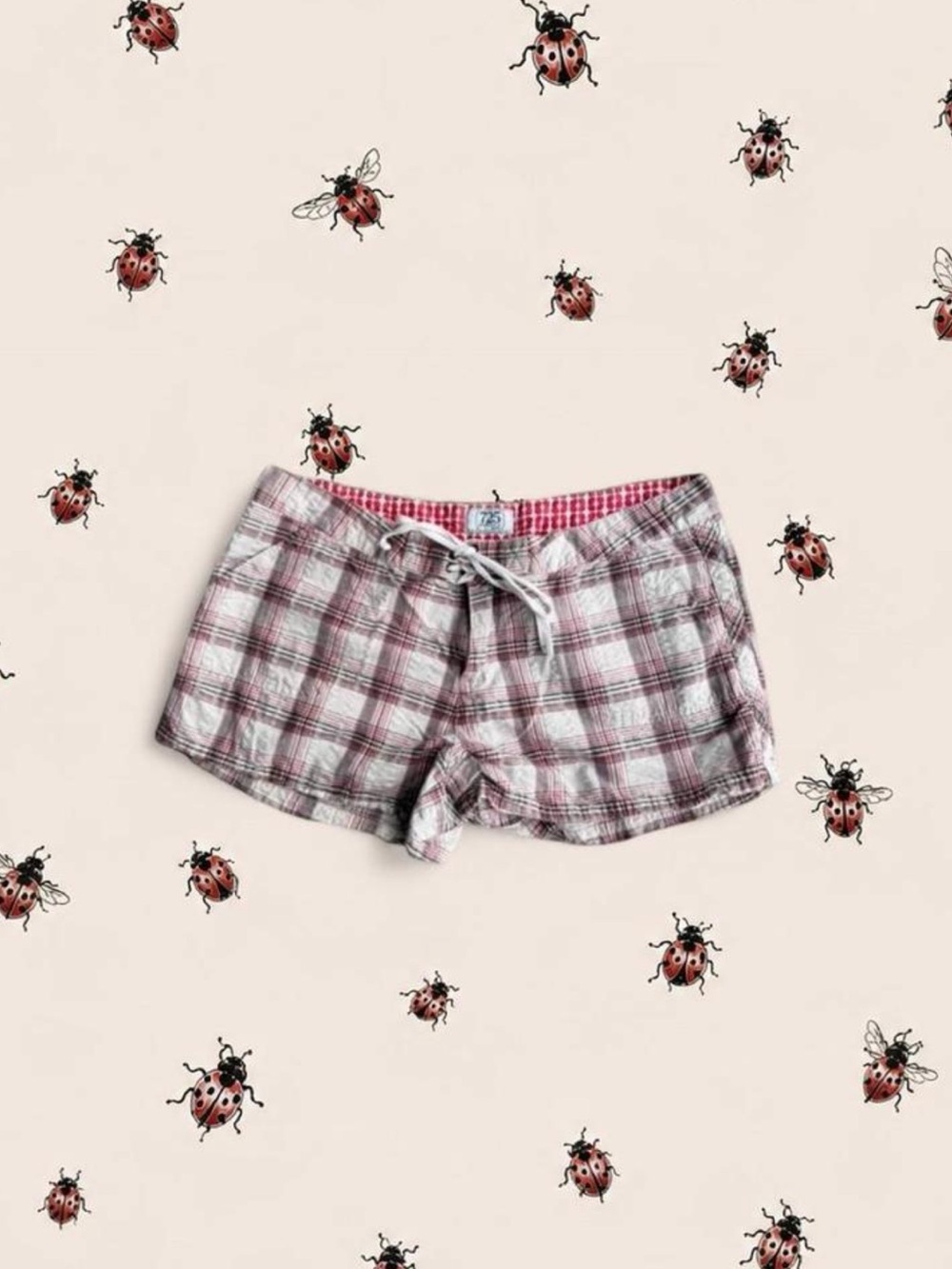 725 Plaid mini shorts